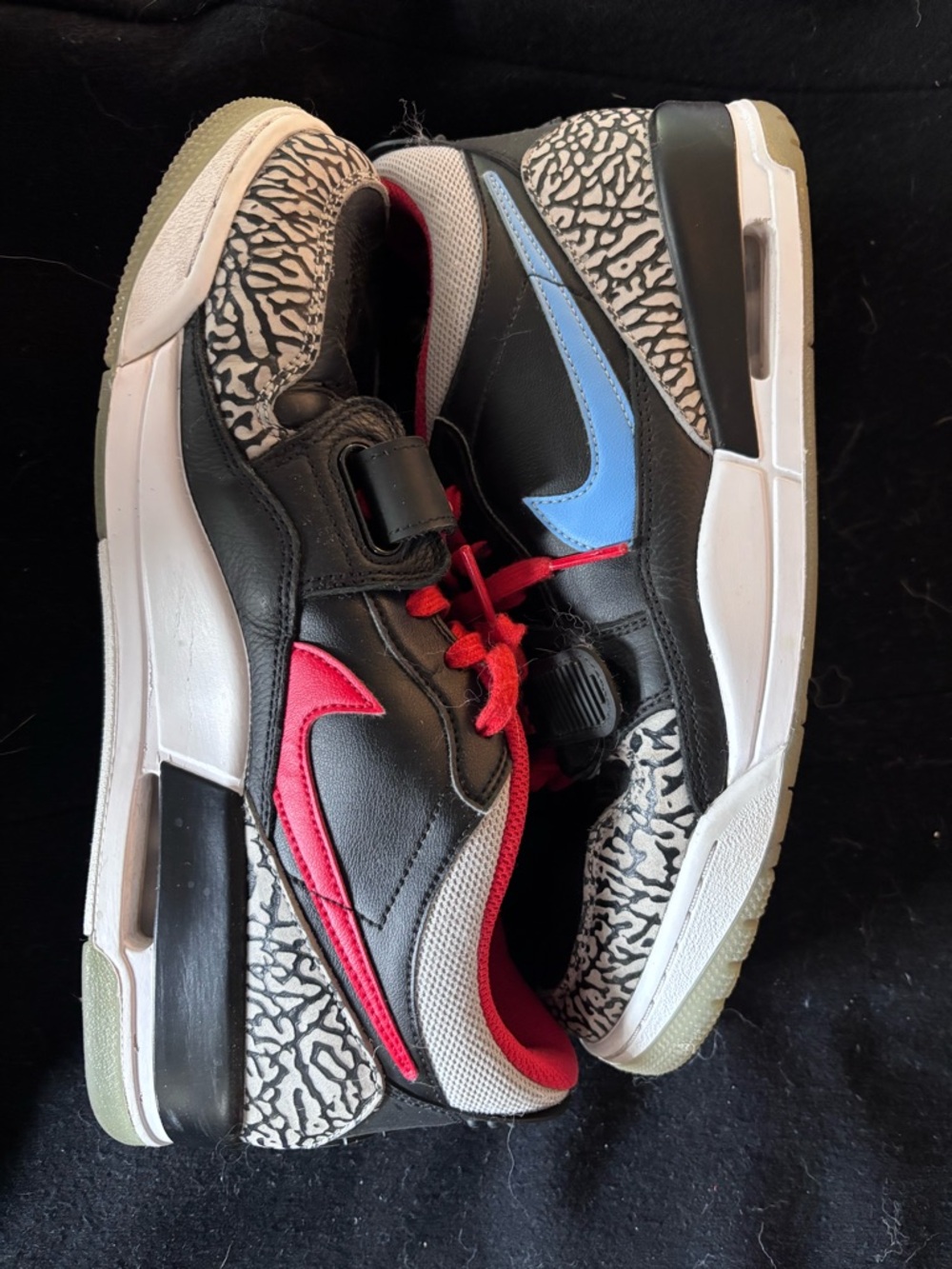 Jordan Black Sneakers with Red & Light Blue Accents